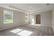Bright and airy bedroom with carpet flooring and an ensuite bathroom at Tbd Ensley Rd, Sorrento, FL 32776
