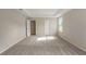 Bright bedroom with carpet flooring and an ensuite bathroom at Tbd Ensley Rd, Sorrento, FL 32776