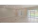 Spacious dining room with tile floors and sliding glass doors at Tbd Ensley Rd, Sorrento, FL 32776