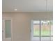 Bright dining room with sliding glass doors leading to backyard at Tbd Ensley Rd, Sorrento, FL 32776