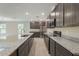 Modern kitchen with granite countertops and stainless steel appliances at Tbd Ensley Rd, Sorrento, FL 32776