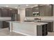 Modern kitchen with granite countertops and stainless steel appliances at Tbd Ensley Rd, Sorrento, FL 32776