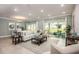 Bright and airy living room with sliding glass doors leading to the backyard at Tbd Ensley Rd, Sorrento, FL 32776