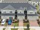 Aerial view of townhouses with garages at 1153 Seaside Mist Trl, Kissimmee, FL 34747