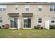 Private backyard with patio and fence at 1153 Seaside Mist Trl, Kissimmee, FL 34747