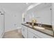 Bathroom boasts double sinks and granite countertops at 1153 Seaside Mist Trl, Kissimmee, FL 34747