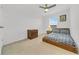 Bright bedroom with a double bed and dresser at 1153 Seaside Mist Trl, Kissimmee, FL 34747