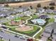 Aerial view of community pool and playground at 1153 Seaside Mist Trl, Kissimmee, FL 34747