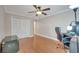 Home office features hardwood floors, ceiling fan and built-in closet at 1153 W Winged Foot Cir, Winter Springs, FL 32708