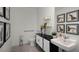 Modern bathroom with stylish vanity, toilet and grab bar at 1328 Hanoverian Dr, Lake Alfred, FL 33850