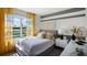 Bright bedroom featuring a comfortable bed and plenty of natural light at 1328 Hanoverian Dr, Lake Alfred, FL 33850