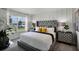 Main bedroom with plush bed and window views at 1328 Hanoverian Dr, Lake Alfred, FL 33850