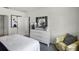 Guest bedroom with bed and dresser, bright and airy at 1328 Hanoverian Dr, Lake Alfred, FL 33850