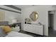 Spacious bedroom with dresser and large mirror, offering abundant storage at 1328 Hanoverian Dr, Lake Alfred, FL 33850