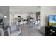Open concept kitchen and dining area with island and seating at 1328 Hanoverian Dr, Lake Alfred, FL 33850