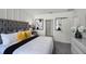 Spacious main bedroom with large bed and en-suite bathroom at 1328 Hanoverian Dr, Lake Alfred, FL 33850