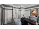 Bright home office with a desk and view to another room at 1328 Hanoverian Dr, Lake Alfred, FL 33850