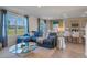 Open concept living room and kitchen with sectional sofa at 1332 Hanoverian Dr, Lake Alfred, FL 33850