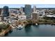 Aerial view showcasing a cityscape and lakefront park at 150 E Robinson St # 1011, Orlando, FL 32801