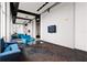 Spacious common area with seating and a large TV at 150 E Robinson St # 1011, Orlando, FL 32801