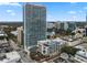 Stunning, modern high-rise condo building with a tennis court and pool on top of the parking garage at 150 E Robinson St # 1011, Orlando, FL 32801