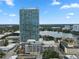 Stunning, modern high-rise condo building with a tennis court and pool on top of the parking garage at 150 E Robinson St # 1011, Orlando, FL 32801