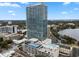 Stunning, modern high-rise condo building with a tennis court and pool on top of the parking garage at 150 E Robinson St # 1011, Orlando, FL 32801