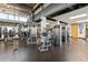 Well-equipped fitness center with various weight machines and a climbing rope at 150 E Robinson St # 1011, Orlando, FL 32801