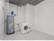 A neutral colored laundry room with new washer and dryer appliances at 150 E Robinson St # 1011, Orlando, FL 32801