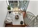 Top-down view of a modern living room with spiral staircase and a balcony with a stunning view at 150 E Robinson St # 1011, Orlando, FL 32801