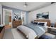 Inviting main bedroom boasts a dresser, closet, ensuite bath, and comfortable king bed at 150 E Robinson St # 1011, Orlando, FL 32801