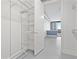 A white walk-in closet with metal shelving for maximum storage at 150 E Robinson St # 1011, Orlando, FL 32801