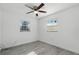 Bright bedroom featuring wood-look flooring and ceiling fan at 1527 Hernandes Dr, Orlando, FL 32808