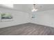 Bright living room with gray flooring and neutral walls at 1527 Hernandes Dr, Orlando, FL 32808