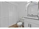 The bathroom features a new vanity, granite counter, and ample storage at 1606 Sandy Point Sq # 53, Orlando, FL 32807