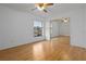 Bedroom featuring hardwood floors, a ceiling fan, and a window with blinds at 1606 Sandy Point Sq # 53, Orlando, FL 32807