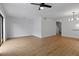 Spacious living room featuring hardwood floors and a ceiling fan at 1606 Sandy Point Sq # 53, Orlando, FL 32807