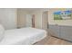 Bright bedroom with a comfortable bed and plenty of storage at 1721 Kona Ln, Davenport, FL 33897
