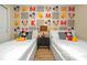 Mickey Mouse themed bedroom with twin beds at 1721 Kona Ln, Davenport, FL 33897
