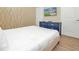 Charming bedroom with a navy dresser and TV at 1721 Kona Ln, Davenport, FL 33897