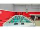 Foosball table in a bright and playful game room at 1721 Kona Ln, Davenport, FL 33897