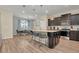 Granite island kitchen with seating for four at 1721 Kona Ln, Davenport, FL 33897