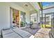 Patio with seating area and access to the pool at 1721 Kona Ln, Davenport, FL 33897