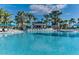 Resort-style pool with a swim-up bar and lounge chairs at 1721 Kona Ln, Davenport, FL 33897