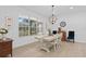 Bright dining room with large window and wood flooring at 19106 Sheldon St, Orlando, FL 32833