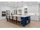 Modern kitchen with white cabinets and a blue island at 19106 Sheldon St, Orlando, FL 32833