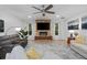 Spacious living room with sectional sofa and fireplace at 19106 Sheldon St, Orlando, FL 32833