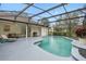 Inviting pool area with covered patio and grill at 19106 Sheldon St, Orlando, FL 32833