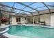 Inviting pool area with covered patio and grill at 19106 Sheldon St, Orlando, FL 32833