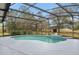Screened pool and patio area with string lights at 19106 Sheldon St, Orlando, FL 32833